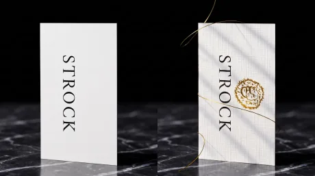Side-by-side comparison: a plain card with flat black text next to the same design on textured linen stock with a gold foil emblem, showing the difference a premium finish makes